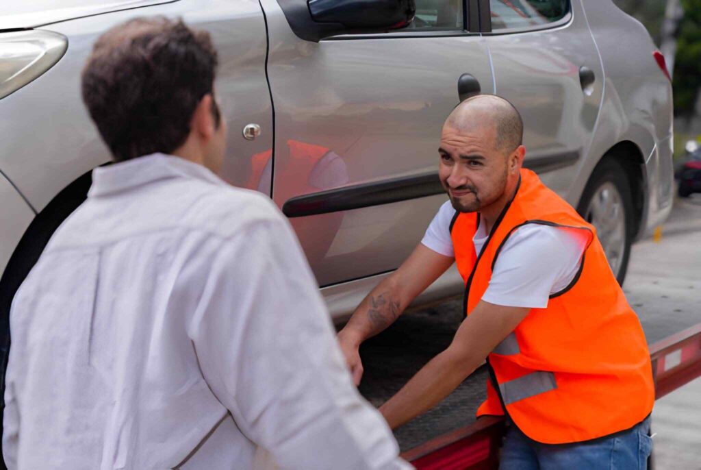 Trusted car recovery services assisting a stranded vehicle on the road